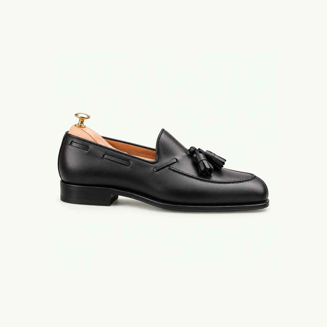 Mocassin noir élégant à pampilles