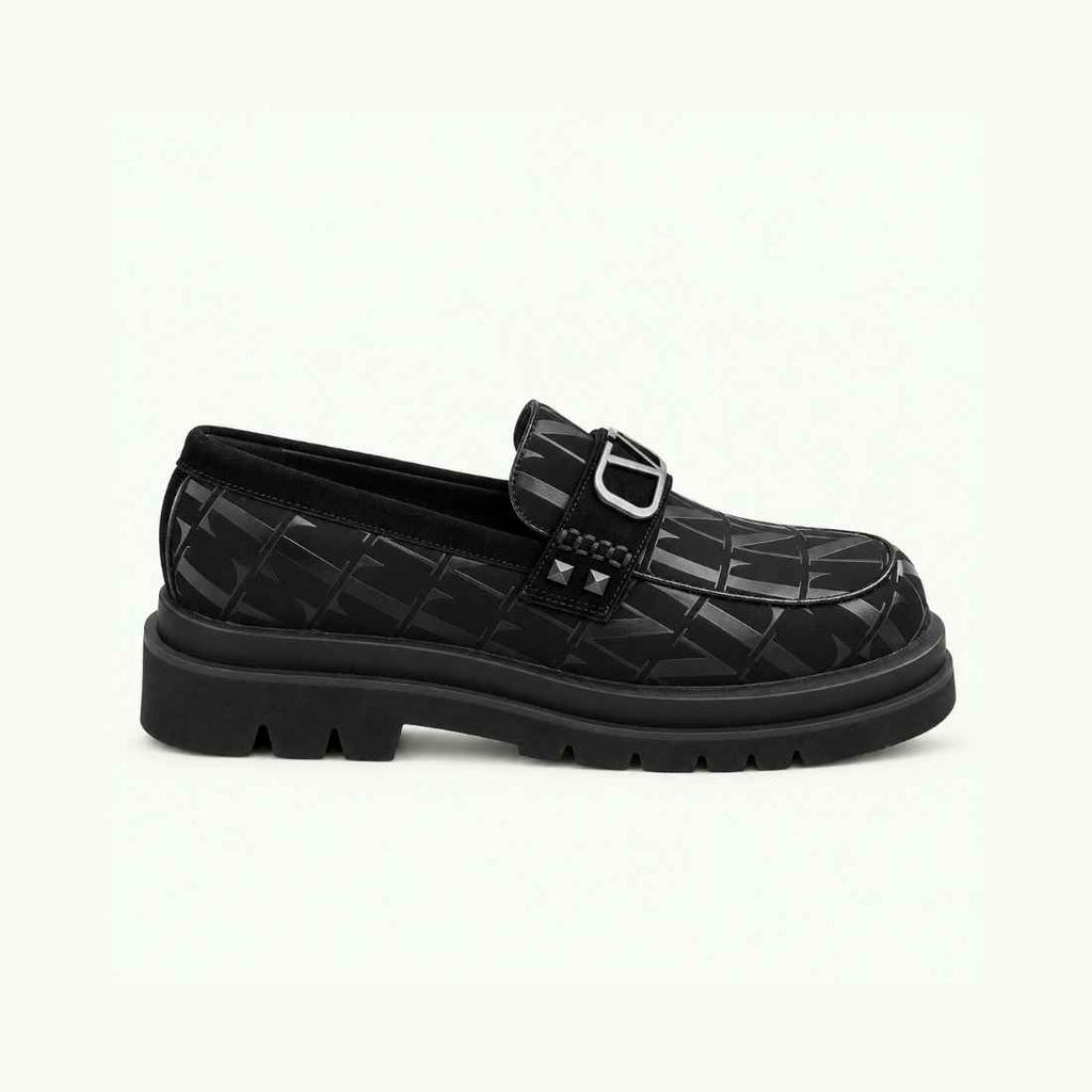 Mocassin noir à motif géométrique et semelle en gomme