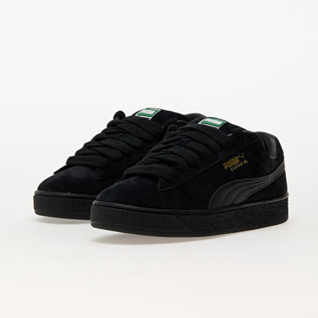 Puma Suede XL tout noir - Sneaker streetwear iconique en daim avec bande blanche signature et semelle épaisse, style urbain tendance
