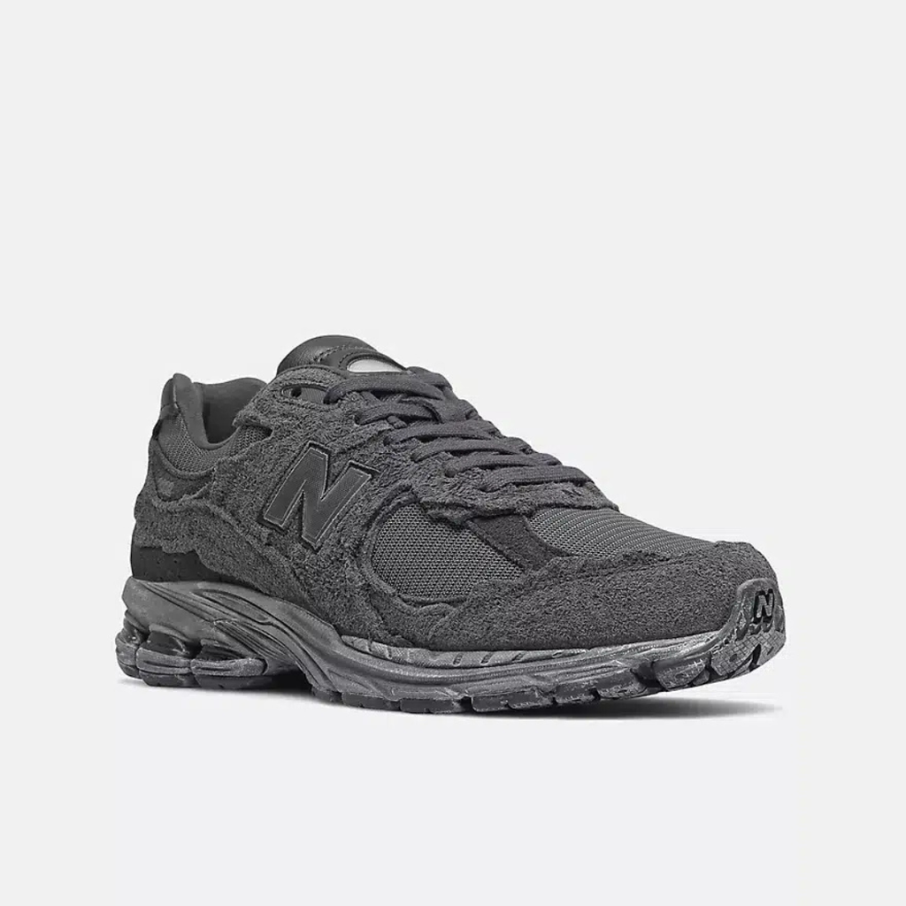 New Balance 2002R gris anthracite - Sneaker running rétro avec logo N signature, semelle sculptée et finitions daim premium, style urbain confortable