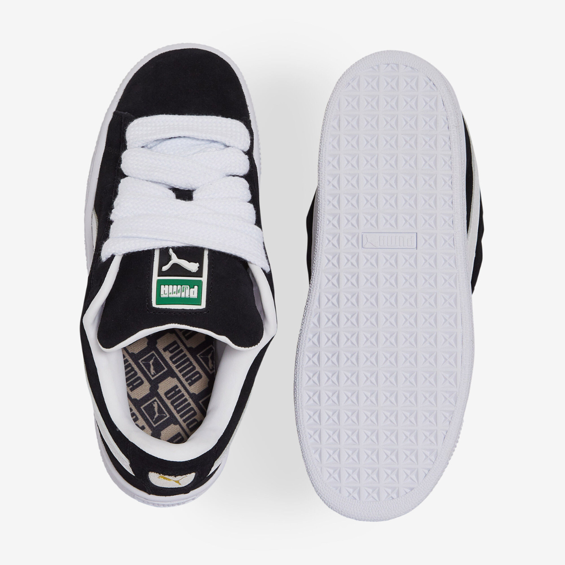 Puma Suede XL noir et blanc - Sneaker streetwear iconique en daim avec bande blanche signature et semelle épaisse, style urbain tendance