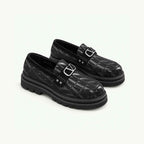 Mocassin noir à motif géométrique et semelle en gomme