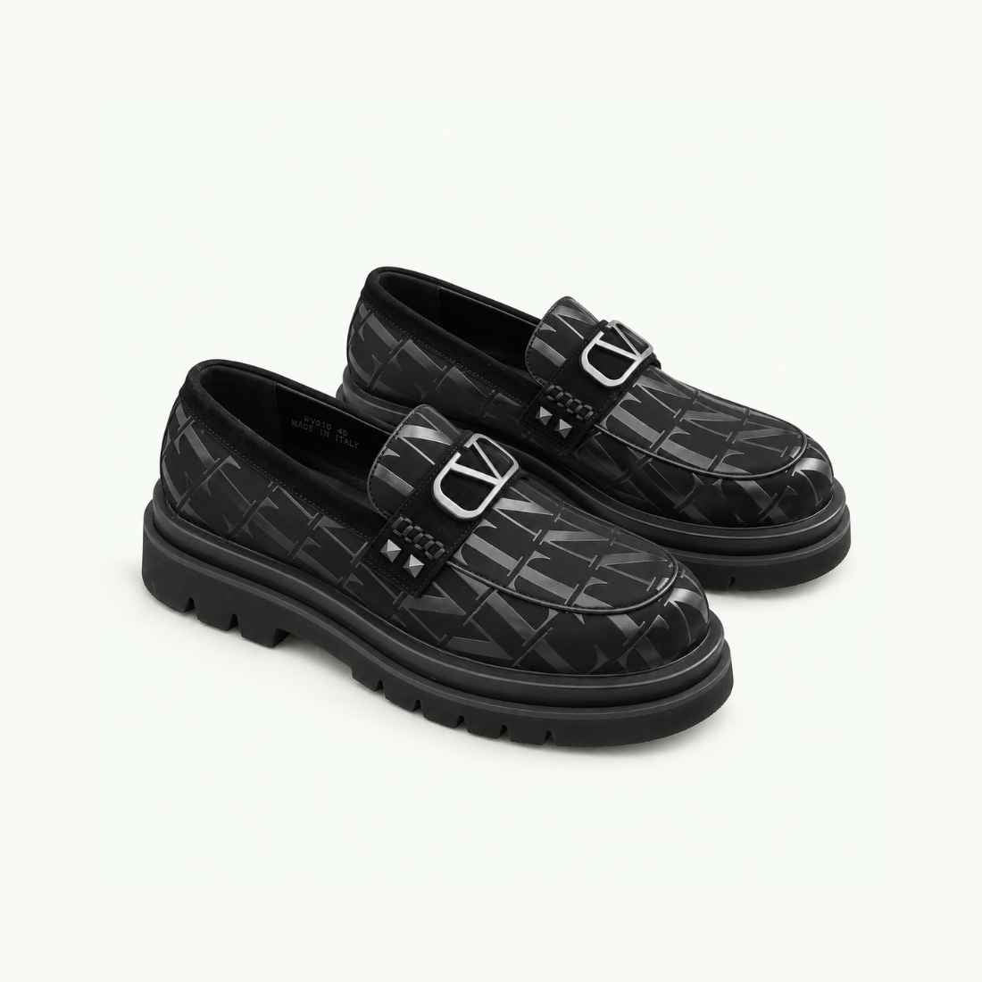 Mocassin noir à motif géométrique et semelle en gomme