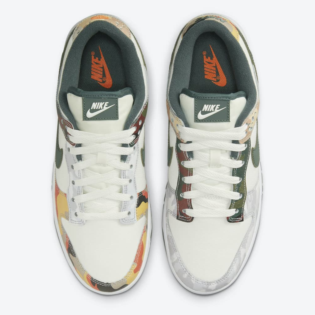 Nike Dunk Low - Vue latérale de la sneaker blanche avec empiècements camouflage beige et marron, swoosh vert olive et semelle bicolore