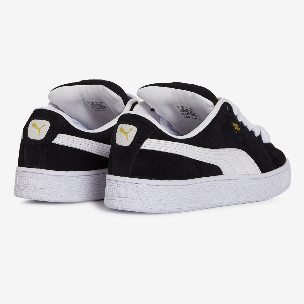 Puma Suede XL noir et blanc - Sneaker streetwear iconique en daim avec bande blanche signature et semelle épaisse, style urbain tendance