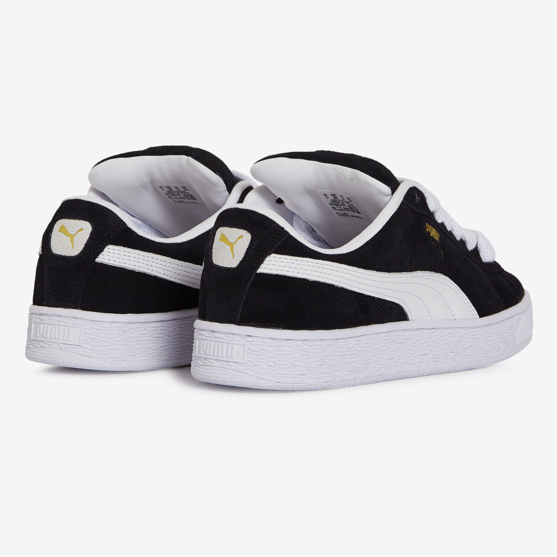 Puma Suede XL noir et blanc - Sneaker streetwear iconique en daim avec bande blanche signature et semelle épaisse, style urbain tendance