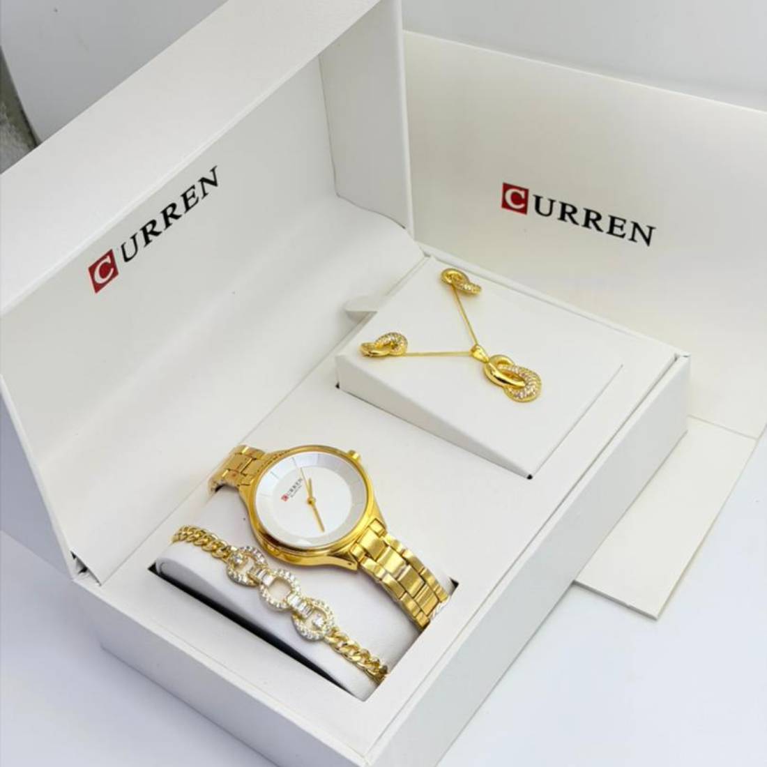 Coffret parure Curren – montre or cadran blanc et bijoux maillons cristaux
