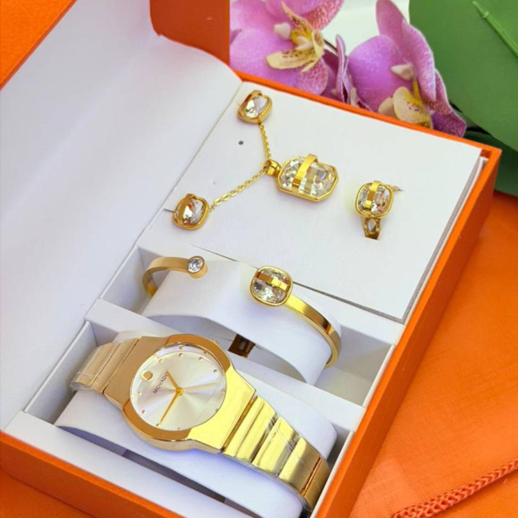 Coffret parure Movado – montre or cadran blanc et bijoux cristal