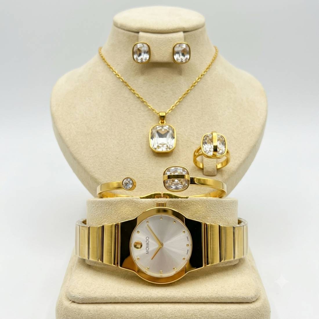 Coffret parure Movado – montre or cadran blanc et bijoux cristal