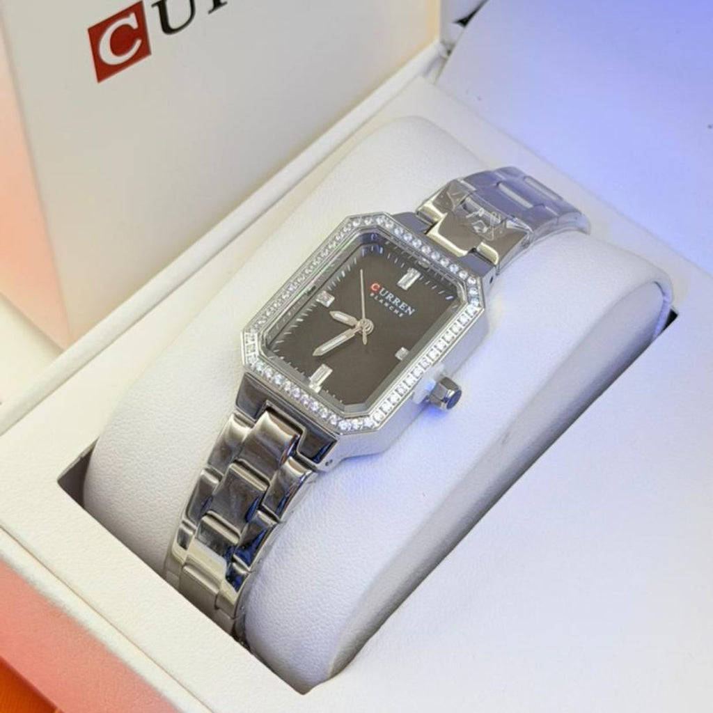 Montre Curren Blanche argentée cadran gris anthracite et boîtier octogonal cristaux baguette