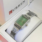 Montre Curren blanche argentée cadran vert jade et lunette cristaux