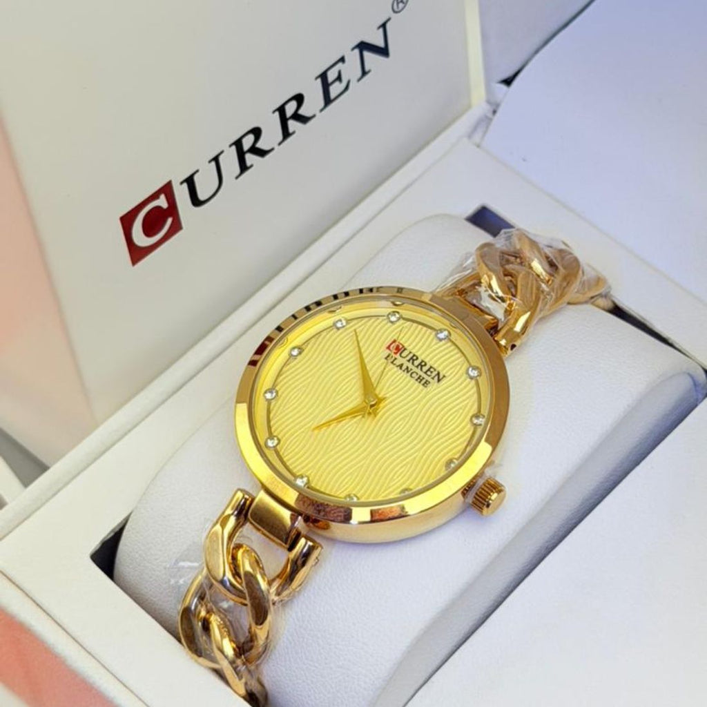 Montre Curren blanche bracelet or et cadran or