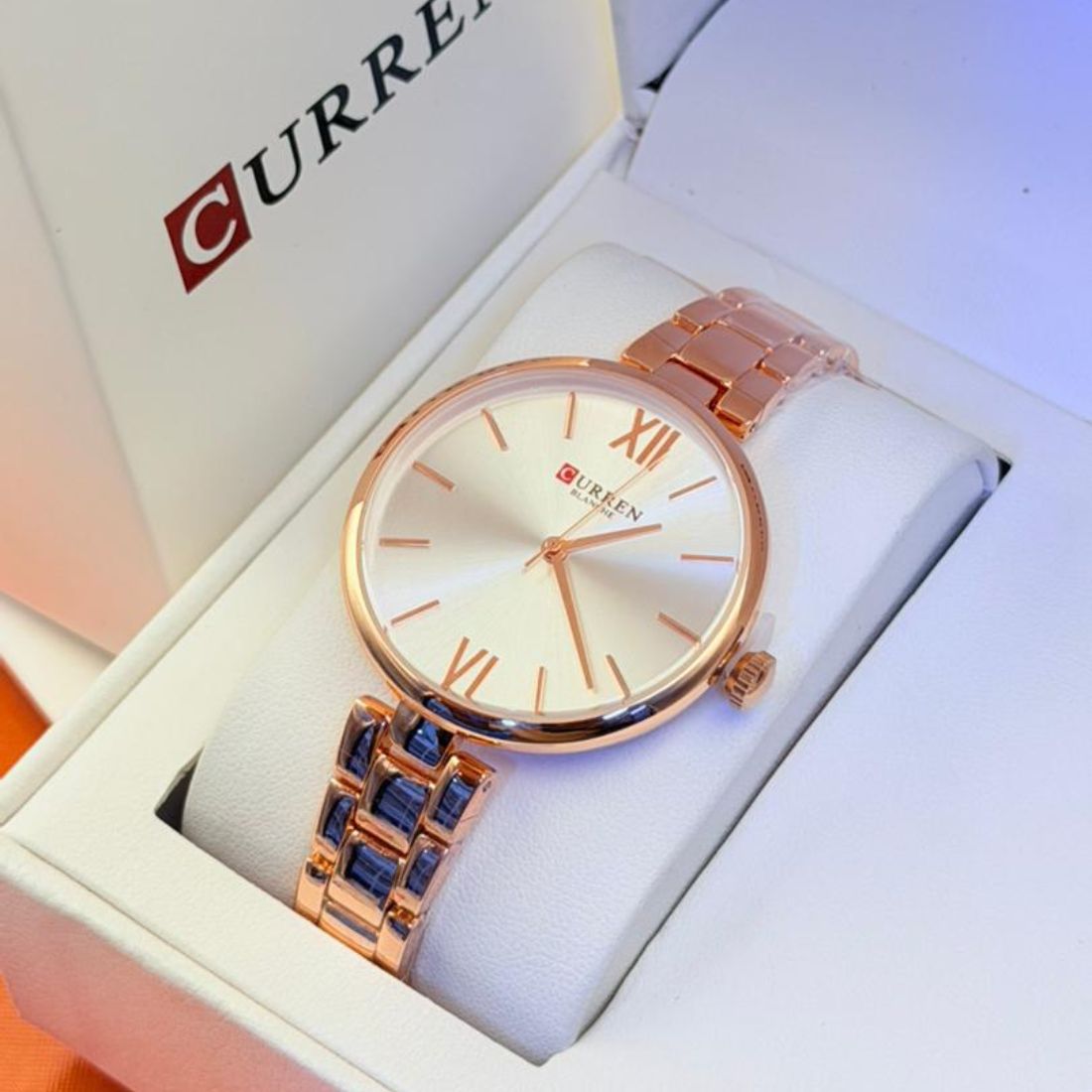 Montre Curren blanche – bracelet or rose et cadran blanche