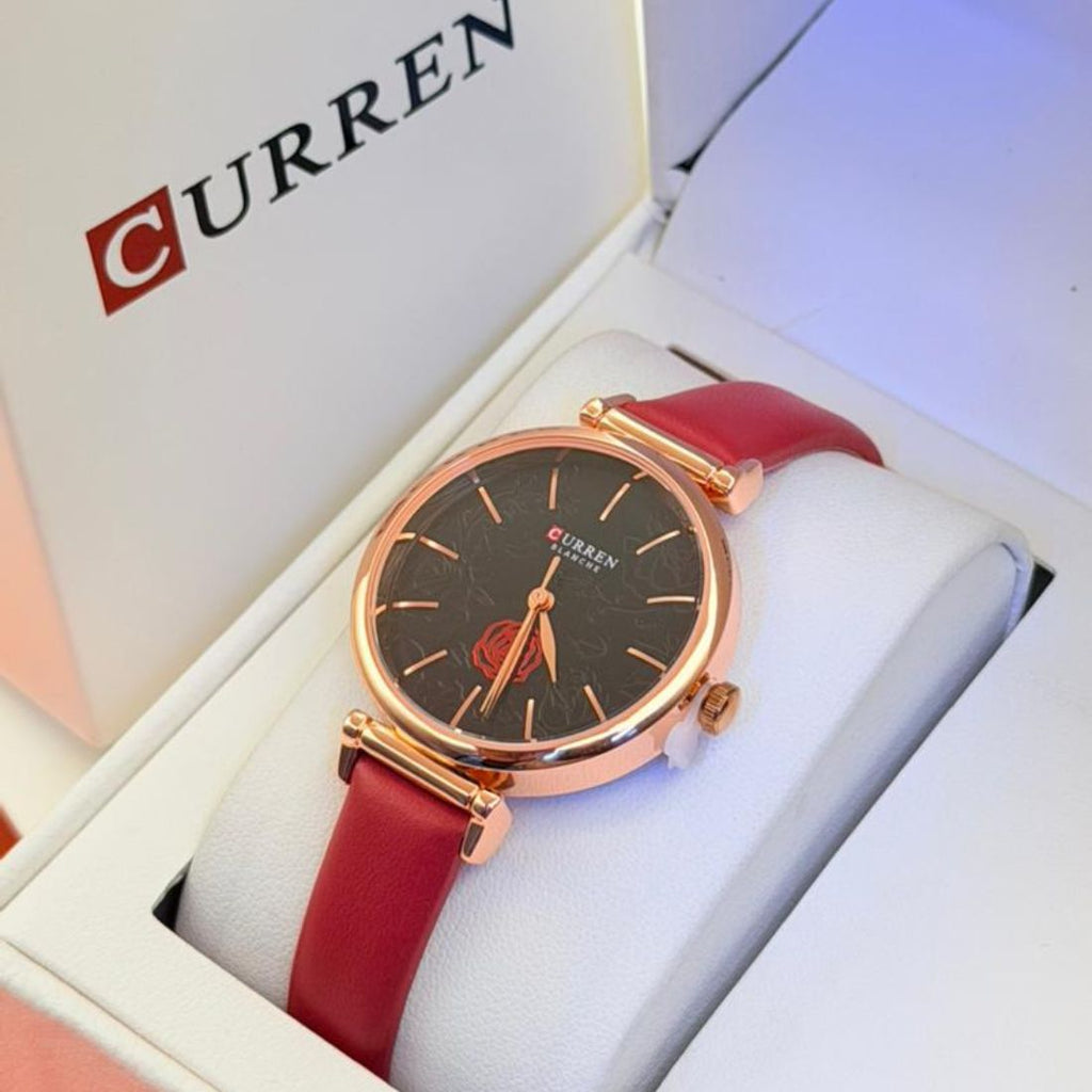 Montre Curren blanche bracelet rose rouge et cadran noir floral