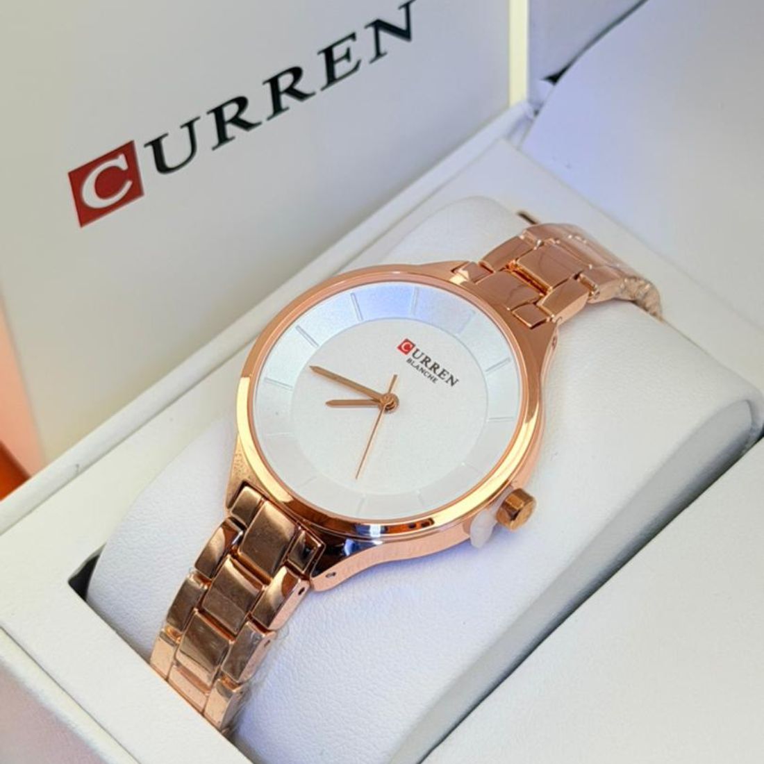 Montre Curren blanche cadran blanc or rose