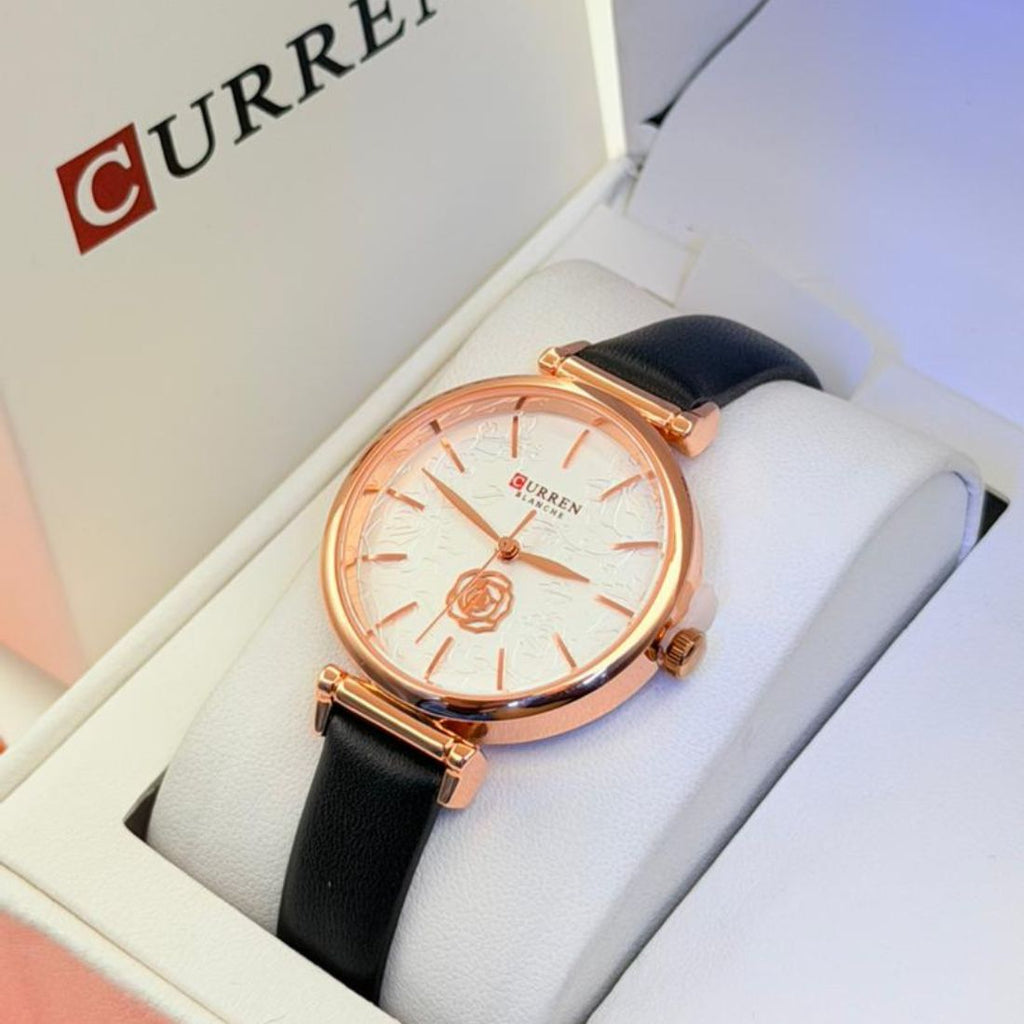 Montre Curren blanche or rose cadran floral et bracelet cuir noir