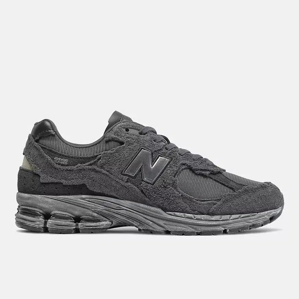New Balance 2002R gris anthracite - Sneaker running rétro avec logo N signature, semelle sculptée et finitions daim premium, style urbain confortable